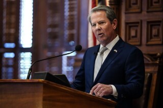 FILE-Georgia Gov. Brian Kemp delivers the State of the State speech, Thursday, Jan. 11, 2024, in Atlanta. Georgia sued the Biden administration on Friday, Feb. 2, to try to keep the state's new health plan for low-income residents running until 2028. (AP Photo/Brynn Anderson, File)