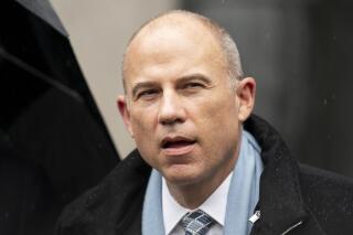 FILE - Michael Avenatti speaks to members of the media after leaving federal court on Feb. 4, 2022, in New York. Incarcerated lawyer Michael Avenatti pleaded guilty Thursday, June 16, 2022, to four counts of wire fraud and a tax-related charge in a federal court case in Southern California accusing him of cheating his clients out of millions of dollars.(AP Photo/John Minchillo, File)