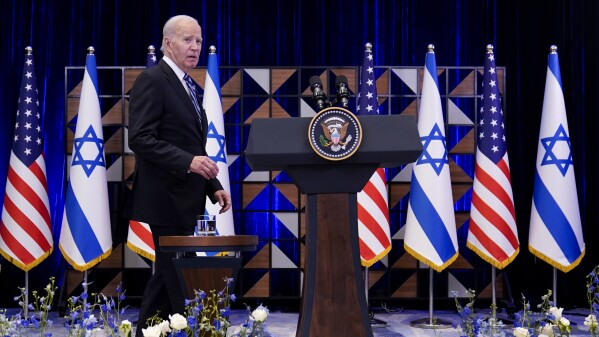 FILE - President Joe Biden walks to the podium to deliver remarks on the war between Israel and Hamas after meeting Israeli Prime Minister Benjamin Netanyahu, Wednesday, Oct. 18, 2023, in Tel Aviv. Democratic views on how President Joe Biden is handling the decades-old conflict between Israelis and Palestinians have rebounded slightly, according to a new poll from 麻豆传媒app-NORC Center for Public Affairs Research. (APPhoto/Evan Vucci, File)