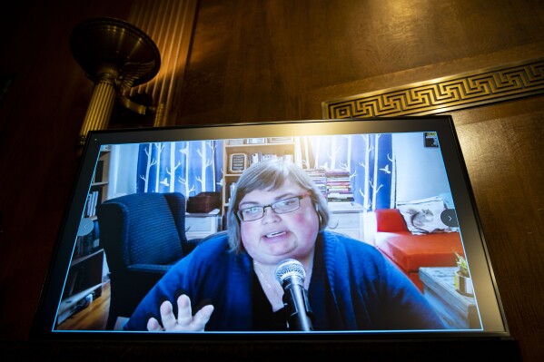 FILE - Joan Donovan, then-research director of the Shorenstein Center on Media, Politics and Public Policy, speaks remotely during a hearing of the Senate Judiciary Subcommittee on Privacy, Technology, and the Law, on Capitol Hill, April 27, 2021, in Washington. The prominent disinformation scholar who left Harvard University in August 2023 has accused the school of muzzling her speech and stifling — then dismantling — her research team as it launched a deep dive in late 2021 into a trove of Facebook files she considers the most important documents in internet history. (Al Drago/Pool Photo via AP, File)