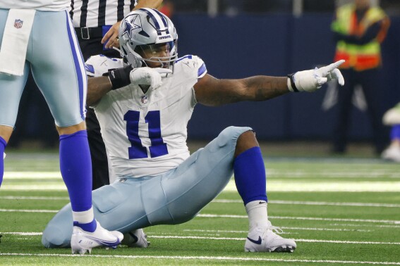 Dallas Cowboys linebacker Micah Parsons celebrates after sacking New York Jets quarterback Zach Wilson during the second half of an NFL football game in Arlington, Texas, Sunday, Aug. 17, 2023. (AP Photo/Michael Ainsworth)