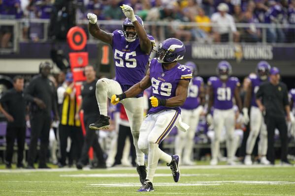 Minnesota Vikings' Danielle Hunter sacks Green Bay Packers' Aaron Rodgers  during the second hal …