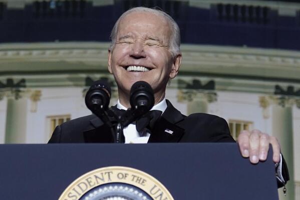 FILE - President Joe Biden laughs as he speaks during the White House Correspondents' Association dinner at the Washington Hilton in Washington, Saturday, April 29, 2023. As Biden, the oldest president in U.S. history, embarks on his reelection campaign, he is increasingly musing aloud about his advanced age, cracking self-deprecating jokes and framing his decades in public life as a plus, hoping to persuade voters his age is an asset rather than a vulnerability. (AP Photo/Carolyn Kaster, File)