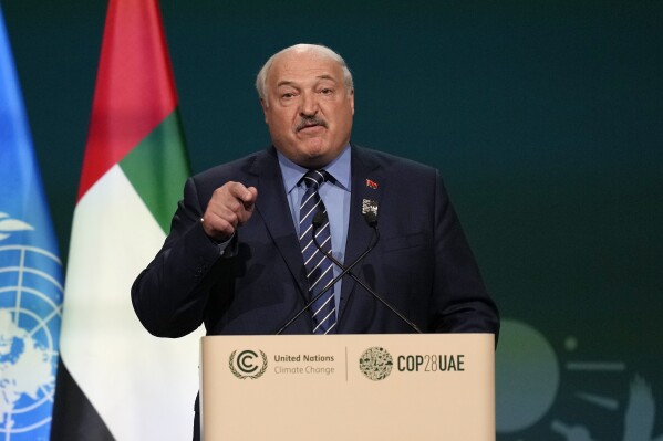 Belarus President Aleksandr Lukashenko speaks during a plenary session at the COP28 U.N. Climate Summit, Friday, Dec. 1, 2023, in Dubai, United Arab Emirates. (AP Photo/Rafiq Maqbool)