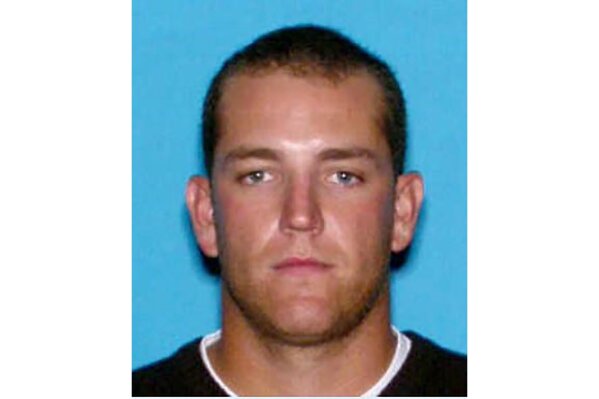 FILE - This undated photo provided by the Scottsdale Police Department, in Arizona, shows Charles Haeger. Police in a Phoenix suburb say the unoccupied vehicle of Haeger, a former professional baseball player sought in the shooting death of his ex-girlfriend, Friday, Oct. 2, 2020, has been found near Flagstaff in northern Arizona. Scottsdale police Sgt. Ben Hoster said police have probable cause to arrest Haeger on suspicion of murder and aggravated assault. (Courtesy of Scottsdale Police Department via AP)