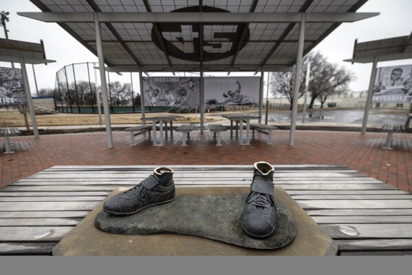 FILE - A view of the bronze Jackie Robinson cleats that were left behind when the statue of the legendary baseball pioneer was stolen from a park in the early morning hours, in Wichita, Kan., Jan. 25, 2024. (Travis Heying/The Wichita Eagle via AP File)