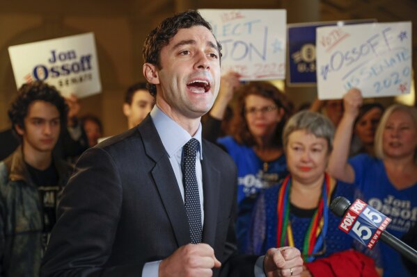 FILE - In this March 4, 2020, file photo, Jon Ossoff speaks to the the media and supporters after he qualified to run in the Senate race against Republican Sen. David Perdue in Atlanta. Republican Sen. David Perdue of Georgia is set to face Democrat Jon Ossoff in the first debate of their U.S. Senate race Monday afternoon, Oct. 12, 2020. (Bob Andres/Atlanta Journal-Constitution via AP, File)