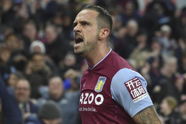 Aston Villa's Danny Ings celebrates after he scores his side's first goal during the English Premier League soccer match between Aston Villa and Wolverhampton Wanderers at Villa Park stadium in Birmingham, England Wednesday, Jan. 4, 2023. (AP Photo/Rui Vieira)