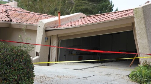 A house in Rolling Hills Estates is severely damaged after a landslide on the Palos Verdes Peninsula in Los Angeles County early Sunday, July 9, 2023. Multiple homes were evacuated in the Los Angeles-area city after a major ground shift put them at risk of collapse, officials said Sunday. (Michael Hixon/The Orange County Register via AP)