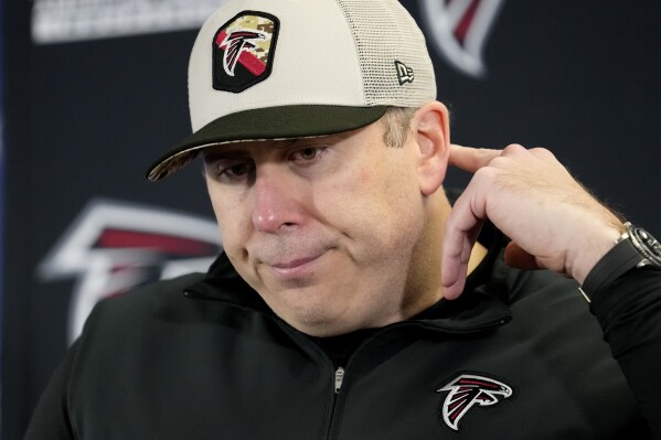 Atlanta Falcons heads coach Arthur Smith faces reporters after his team's 37-17 loss to the Chicago Bears after an NFL football game Sunday, Dec. 31, 2023, in Chicago. (AP Photo/Charles Rex Arbogast)