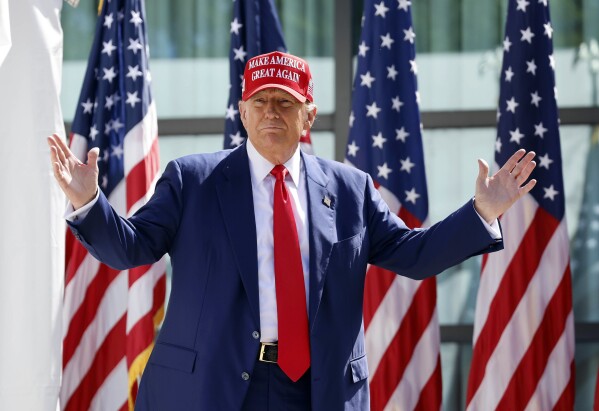Former President Donald Trump enters a campaign event, June 18, 2024, in Racine, Wis. (AP Photo/Jeffrey Phelps, File)