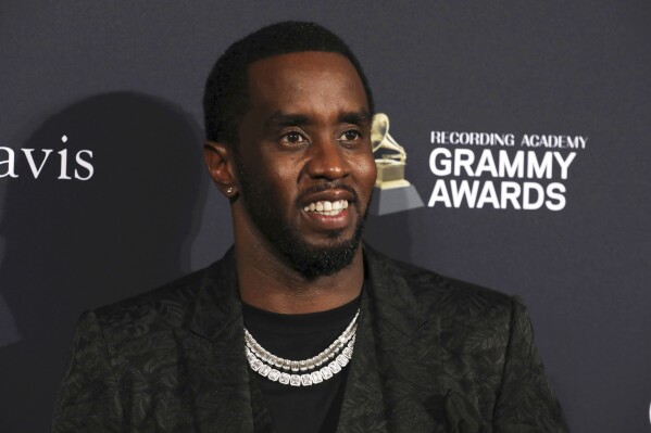 FILE - Sean Combs arrives at the Pre-Grammy Gala And Salute To Industry Icons at the Beverly Hilton Hotel on Saturday, Jan. 25, 2020, in Beverly Hills, Calif. A woman who says Combs subjected her to violence and abuse over several years in the 1990s has filed a lawsuit in New York, Thursday, May 23, 2024, accusing the rapper of sexual assault, battery and gender-motivated violence. (Photo by Mark Von Holden/Invision/AP, File)