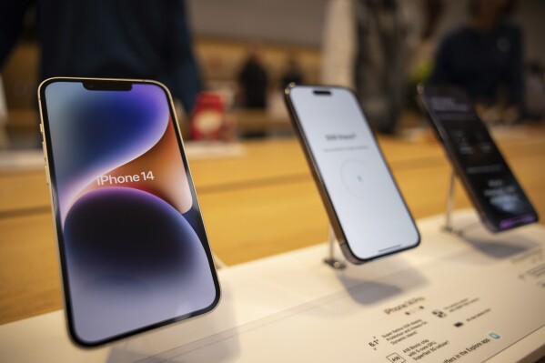 The iPhone 14, iPhone 14 Pro and iPhone 14 Pro Max are displayed at the Apple Fifth Avenue store, Friday, Sept. 16, 2022, in New York. (AP Photo/Yuki Iwamura, File)