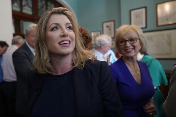 British Member of Parliament Penny Mordaunt launches her campaign to be Conservative Party leader and Prime Minister, at the Cinnamon Club, in Westminster, London, Wednesday July 13, 2022. Conservative Party lawmakers in Britain are casting ballots Wednesday in the first round of an election to replace Prime Minister Boris Johnson. (Stefan Rousseau/PA via AP)