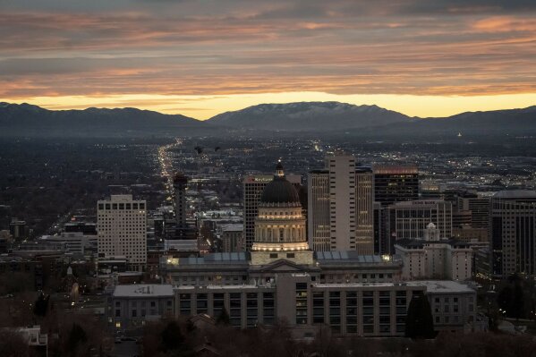 The Utah State Capitol is illuminated against the setting sun in Salt Lake City, Sunday, Nov. 15, 2020. Utah is a place where right-wing Republicans have fought for the rights of undocumented immigrants and deeply religious legislators have enacted some of the nation’s strongest protections for gays and lesbians. (AP Photo/Wong Maye-E)
