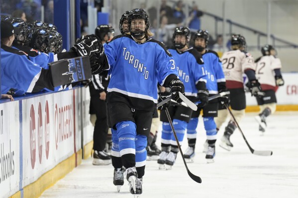Toronto's Hannah Miller celebrates after scoring against Montreal during the first period of a PWHL hockey game Friday, March 8, 2024, in Toronto. (Chris Young/The Canadian Press via AP)