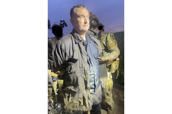 This photo made available by the Ramsey County Sheriff's Office shows Vance Luther Boelter, the man accused of assassinating the top Democrat in the Minnesota House, as he was arrested late Sunday, June 15, 2025. (Ramsey County Sheriff's Office via AP)