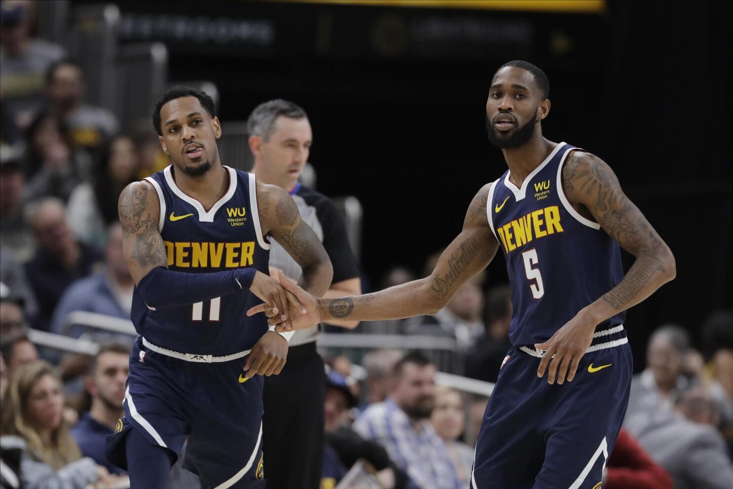 AP source: Nuggets and Wizards agree to 4-player swap