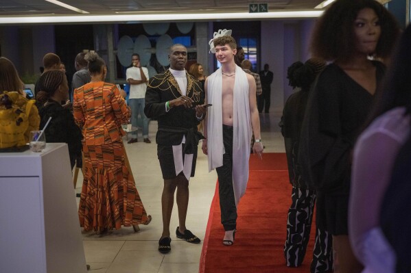 Fashionistas arrive for Niger's designer Alia Bare's show during Johannesburg Fashion Week 2023 in Johannesburg, South Africa, Thursday, Nov. 9, 2023. (AP Photo/Jerome Delay)