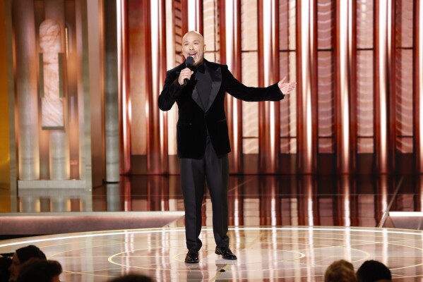 This image released by CBS shows host Jo Koy during the 81st Annual Golden Globe Awards in Beverly Hills, Calif., on Sunday, Jan. 7, 2024. (Sonja Flemming/CBS via AP)