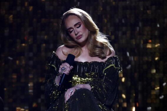 Adele performs on stage at the Brit Awards 2022 in London Tuesday, Feb. 8, 2022. (Photo by Joel C Ryan/Invision/AP)