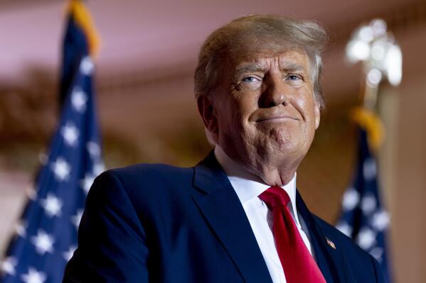 FILE - Former President Donald Trump announces he is running for president for the third time as he smiles while speaking at Mar-a-Lago in Palm Beach, Fla., Nov. 15, 2022. A federal appeals court is hearing arguments Tuesday on whether to shut down an independent review of the documents seized in an FBI search of former President Donald Trump’s Florida home.  (AP Photo/Andrew Harnik, File)