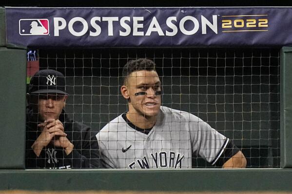 New York Yankees center fielder Aaron Judge watches play from the dugout during the second inning in Game 2 of baseball's American League Championship Series between the Houston Astros and the New York Yankees, Thursday, Oct. 20, 2022, in Houston. (AP Photo/Eric Gay)