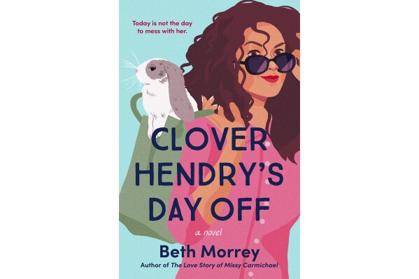 This cover image released by G.P Putnam's Sons shows "Clover Hendry's Day Off" by Beth Morrey. (G.P Putnam's Sons via AP)