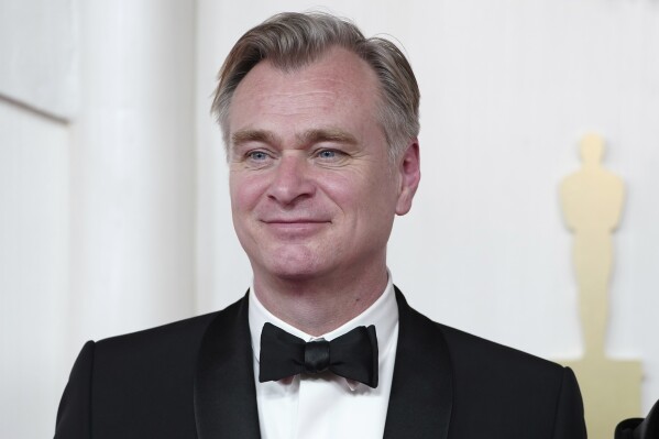 Christopher Nolan arrives at the Oscars on Sunday, March 10, 2024, at the Dolby Theatre in Los Angeles. (Photo by Jordan Strauss/Invision/AP)