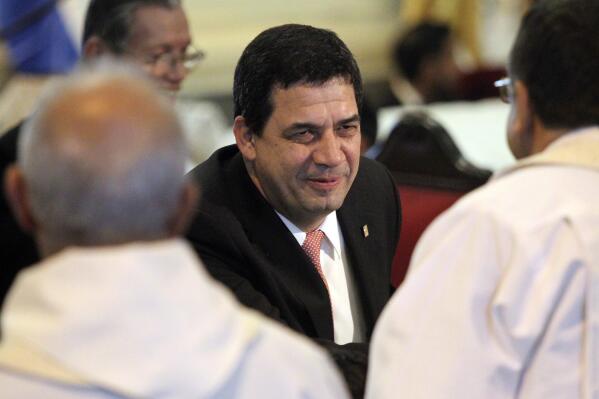 FILE - Paraguay's Vice President Hugo Velazquez smiles during "Te Deum" at the Cathedral in Asuncion, Paraguay, Aug. 15, 2018. Velazquez has been included on a U.S. list of politicians considered to be corrupt, according to U.S. ambassador to Paraguay Marc Osfield during a press conference in Asuncion on Aug. 12, 2022. (AP Photo/Marta Escurra, File)