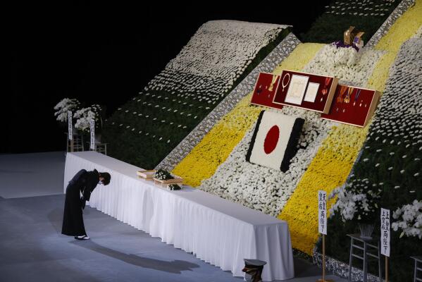 Akie Abe, wife of former Japanese Prime Minister Shinzo Abe, bows at the altar during his state funeral, Tuesday, Sept. 27, 2022, in Tokyo. He was assassinated in July. (Kim Kyung-Hoon/Pool Photo via AP)