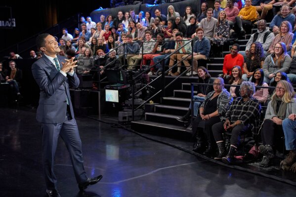 This undated image shows host Trevor Noah with his audience during a taping of "The Daily Show with Trevor Noah." The show, along with other New York-based late night talk shows "The Tonight Show S...