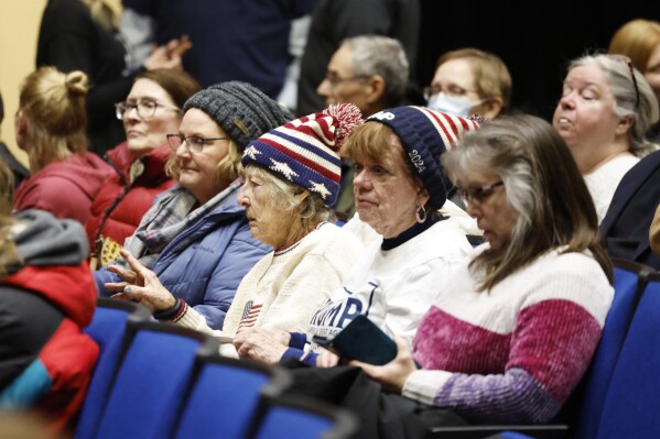Caucusgoers gather to cast their vote for a Republican candidate at Central High School on Monday in Davenport, Iowa. (Katelyn Metzger/Quad City Times via AP)