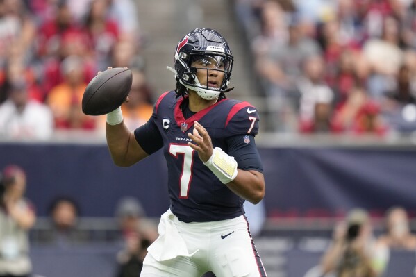 Houston Texans quarterback C.J. Stroud looks to pass against the Tampa Bay Buccaneers during the first half of an NFL football game, Sunday, Nov. 5, 2023, in Houston. (AP Photo/Eric Christian Smith)