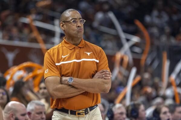 Texas associate head coach Rodney Terry looks on during the first half of an NCAA college basketball game against Rice, Monday, Dec. 12, 2022, in Austin, Texas. (AP Photo/Stephen Spillman)
