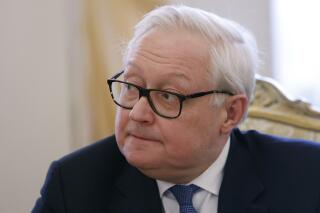 FILE - Russian Deputy Foreign Minister Sergei Ryabkov attends a meeting in Moscow, Russia, Tuesday, March 15, 2022. Ryabkov said Wednesday, March 29, 2023, that Moscow will no longer inform the U.S. about its missile tests, an announcement that came as the Russian military deployed mobile launchers in Siberia in a show of the country’s massive nuclear capability amid the fighting in Ukraine. (Maxim Shemetov/Pool Photo via AP, File)