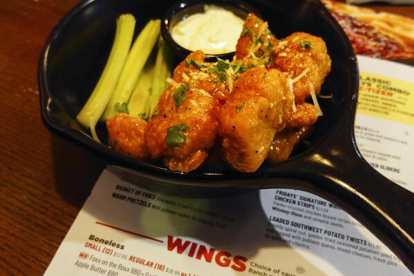 An order of "boneless chicken wings" is shown at a restaurant in Willow Grove, Pa., Wednesday, Feb. 8, 2023. With the Super Bowl at hand, behold the cheerful untruth that has been perpetrated upon (and generally with the blessing of) the chicken-consuming citizens of the United States on menus across the land: a 鈥渂oneless wing鈥� that isn鈥檛 a wing at all. (APPhoto/Matt Rourke)