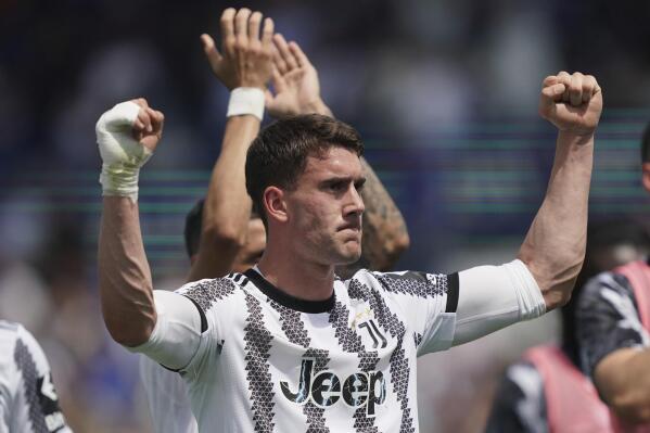 Juventus' Dusan Vlahovic celebrates after scoring his side's second goal during the Serie A soccer match between Atalanta and Juventus at Gewiss Stadium, Bergamo, Italy, Sunday May 7, 2023. (Spada/LaPresse via AP)