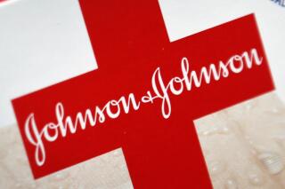 FILE - This Oct. 16, 2012 file photo shows the Johnson & Johnson logo on a package of Band-Aids, in St. Petersburg, Fla. Johnson & Johnson is splitting into two companies, separating the division that sells Band-Aids and Listerine, from its medical device and prescription drug business. The company selling prescription drugs and medical devices will keep Johnson & Johnson as its name, the company said Friday, Nov. 12, 2021. (AP Photo/Chris O'Meara, File)