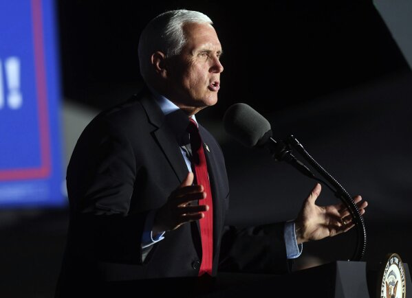 Vice President Mike Pence speaks during a campaign event at Wilmington International Airport in Wilmington, N.C., Tuesday, Oct. 27, 2020. The event was his third of the day after stops in Greensboro and Greenville, S.C. (Matt Born/The Star-News via AP)