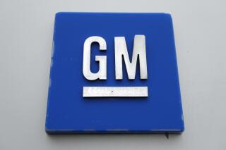 This Jan. 27, 2020 photo shows the General Motors logo.  General Motors is shutting down its pickup truck factory in Ft. Wayne, Indiana, Friday, March 25, 2022, for two weeks next month because the company has run short of computer chips. It’s a sign that the auto industry is still facing problems more than a year after the chip shortage surfaced in late 2020.   (AP Photo/Paul Sancya)