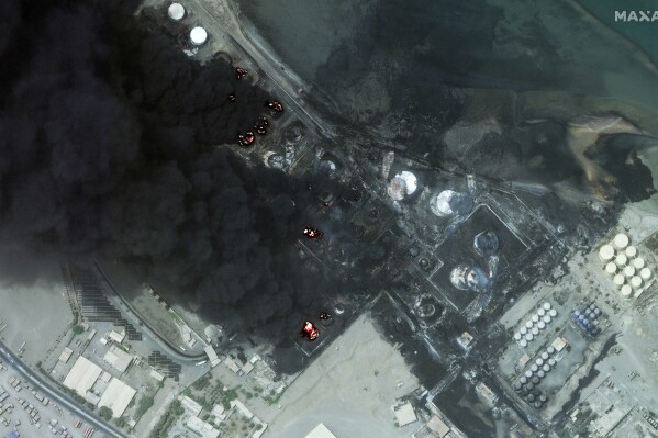 This satellite image provided by Maxar Technologies shows a close view of burning oil tanks in Hodeidah, Yemen, July 21, 2024. (Satellite image ©2024 Maxar Technologies via ĢӰԺ)