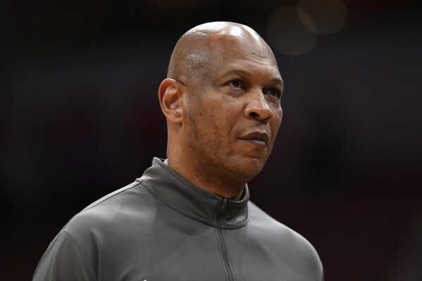 FILE - Louisville head basketball coach Kenny Payne looks at the scoreboard following an NCAA college basketball game against Virginia Tech in Louisville, Ky., Tuesday, March 5, 2024. Louisville has fired Kenny Payne as head men’s basketball coach after going 12-52 just two seasons that marked the storied program’s worst consecutive finishes in its 110-year history. The school announced Payne’s dismissal on Wednesday, March 13. (AP Photo/Timothy D. Easley, File)