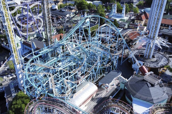 FILE - Aerial picture of rollercoaster Jetline at amusement park Groena Lund in Stockholm, Sweden, Monday June 26, 2023. A criminal investigation into a fatal roller coaster accident in Stockholm in June where one was killed and nine injured when some passengers plunged to the ground in an amusement park accident, was caused by a newly installed “support arm breaking so that the wheels on the cart fell off.” (Marko Saavala/TT News Agency via AP, File)