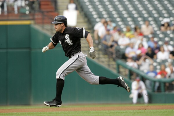 Chicago White Sox's Scott Podsednik steals second base during a baseball game against the Cleveland Indians, June 29, 2009, in Cleveland. (AP Photo/Mark Duncan, File)