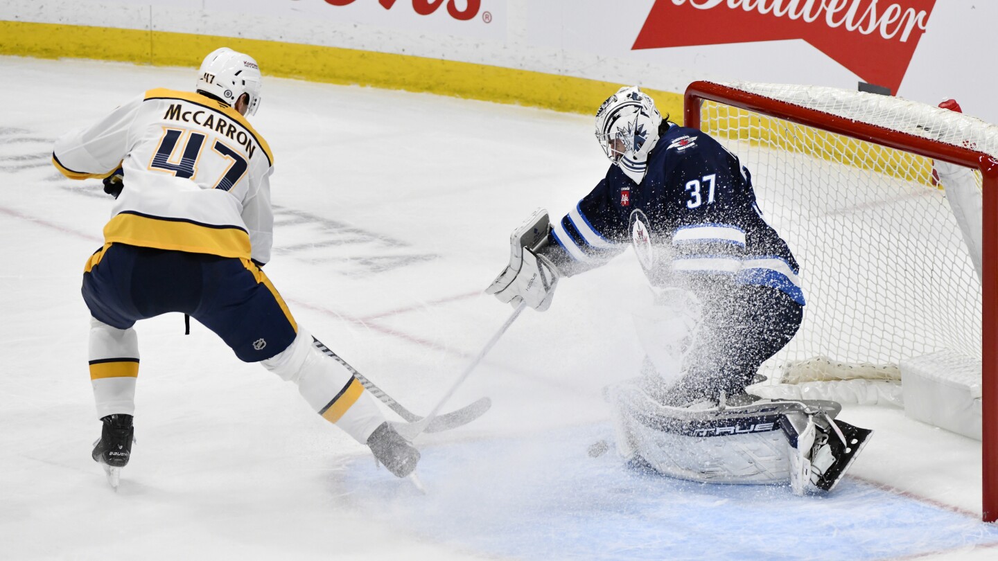 Hellebuyck's 300th NHL Win Highlights Jets' Victory