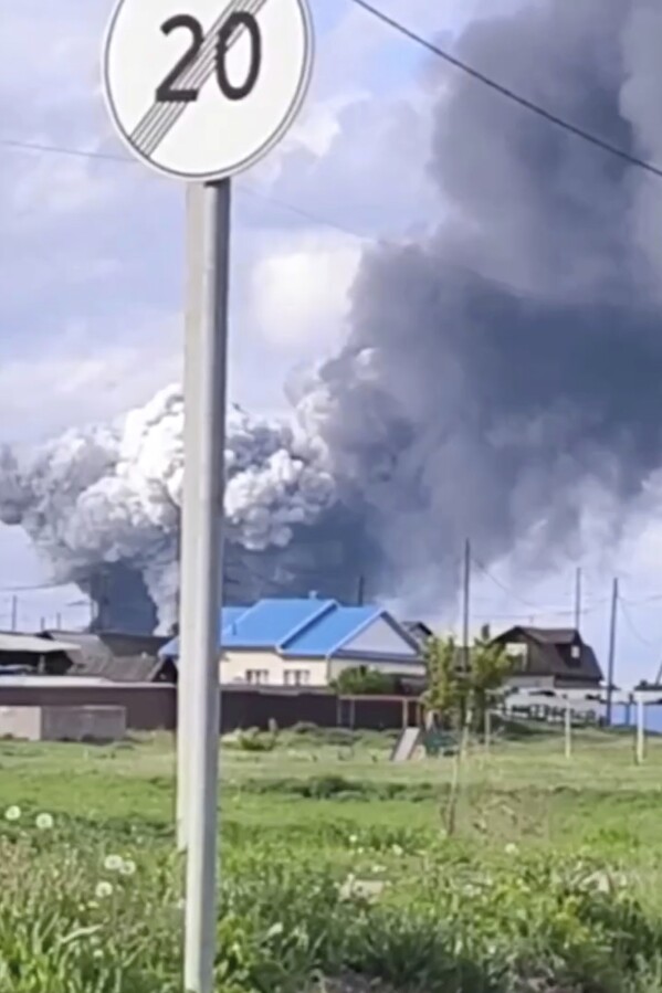 In this photo released by Governor of Irkutsk region Igor Kobzev telegram channel on Sunday, June 1, 2025, plumes of smoke are seen rising over the Belaya air base in the Irkutsk region in eastern Siberia after a Ukrainian drone attack in the Irkutsk region, more than 4,000 kilometers (2,500 miles) from Ukraine. (Governor of Irkutsk region Igor Kobzev telegram channel via AP)
