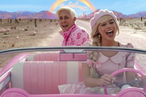 FILE - This image released by Warner Bros. Pictures shows Ryan Gosling, left, and Margot Robbie in a scene from 
