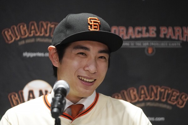San Francisco Giants' Jung Hoo Lee speaks during a baseball news conference in San Francisco, Friday, Dec. 15, 2023. (AP Photo/Jeff Chiu)