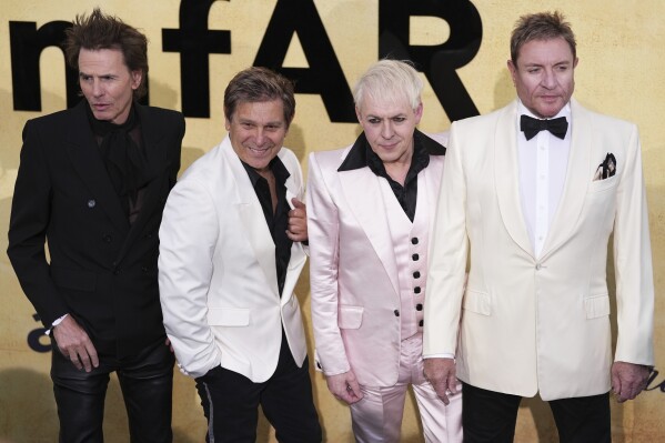 John Taylor, from left, Roger Taylor, Nick Rhodes, Simon Le Bon of Duran Duran pose for photographers upon arrival at the amfAR Cinema Against AIDS benefit at the Hotel du Cap-Eden-Roc, during the 78th Cannes international film festival, Cap d'Antibes, southern France, Thursday, May 22, 2025. (Photo by Scott A Garfitt/Invision/AP)
